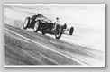 Amilcar and Bugatti on the Brooklands banking